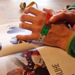 Place the tape below the knuckles and above the thumb over the open, slightly bent hand and remove the measuring tape